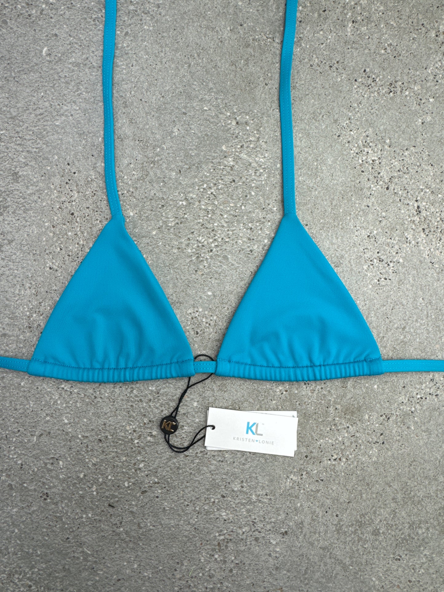 Top de bikini en verde azulado